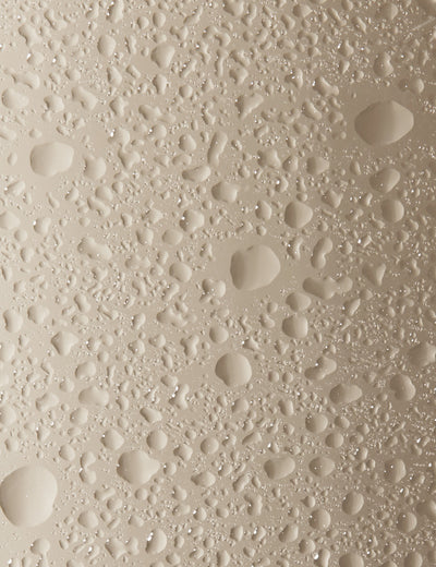 Close-up photo of toning mist droplets.